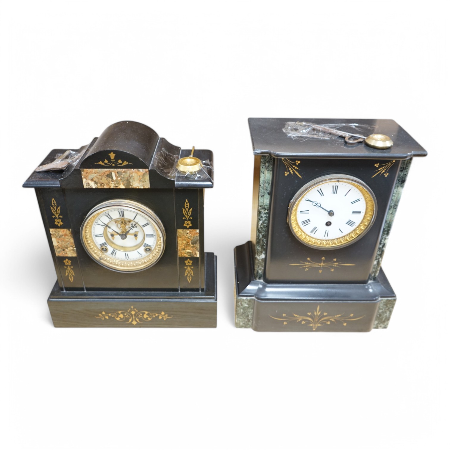 Two Victorian slate mantel clocks, each with pendulum and key, largest 35cm high. Condition - fair to good, untested
